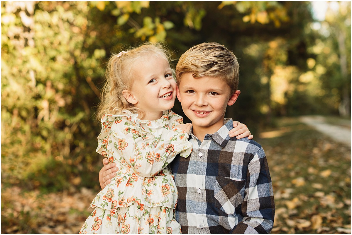 Fall picture of siblings, boy and girl.